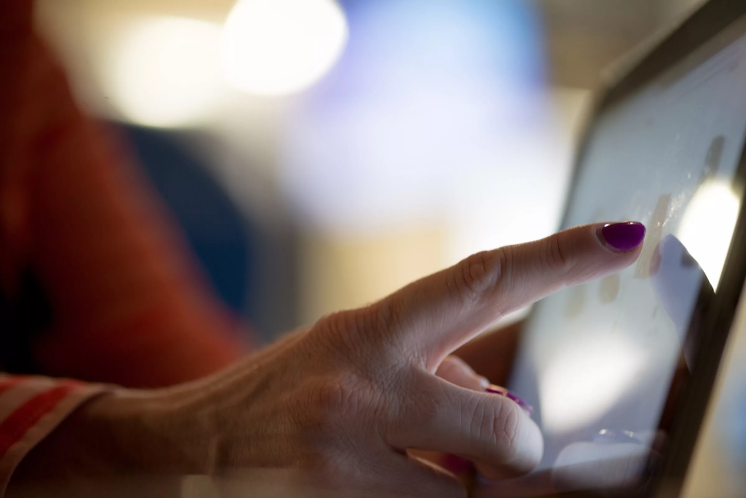 A person using a touch screen computer